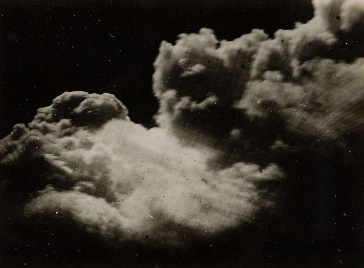 WILSON A. SNOWFLAKE BENTLEY (1865-1931) A group of four photographs, including two snowy landscapes, and two cloud studies.